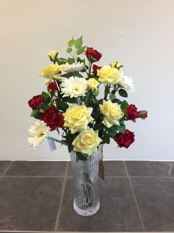 Long stemmed vase arrangement