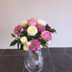 Long stemmed vase arrangement