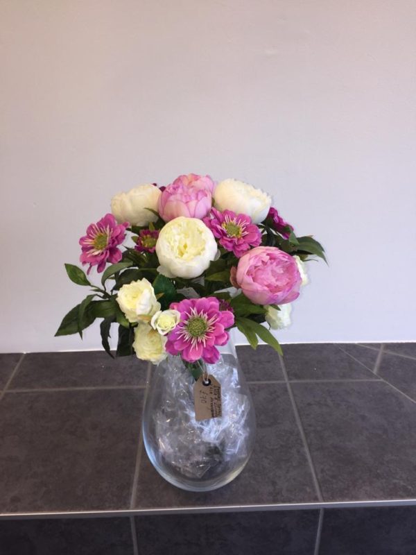 Long stemmed vase arrangement